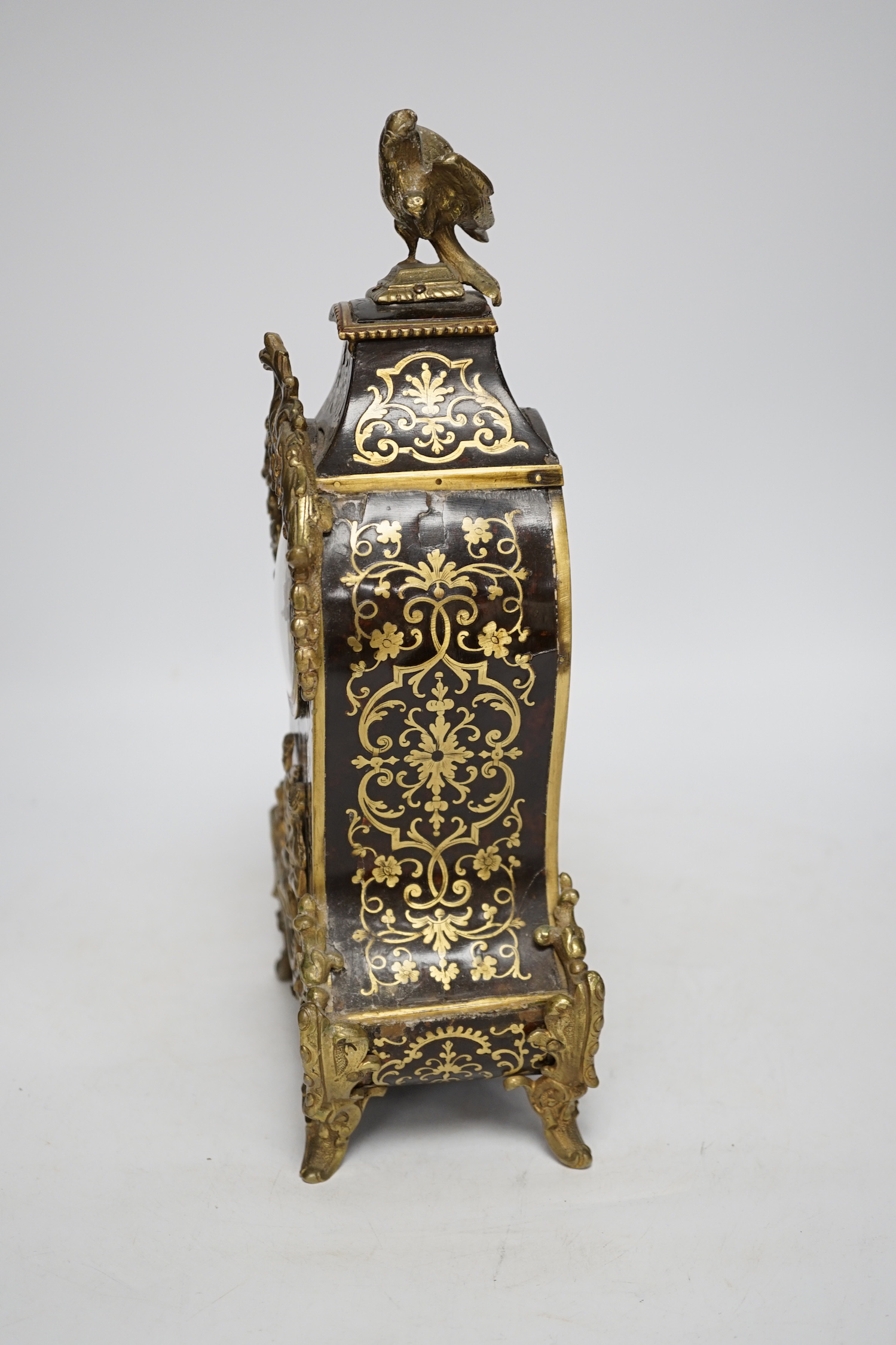 A French Boullework mantel timepiece, retailed by Payne's, with balance escapement, 31.5cm